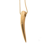 Golden tusk bead detail