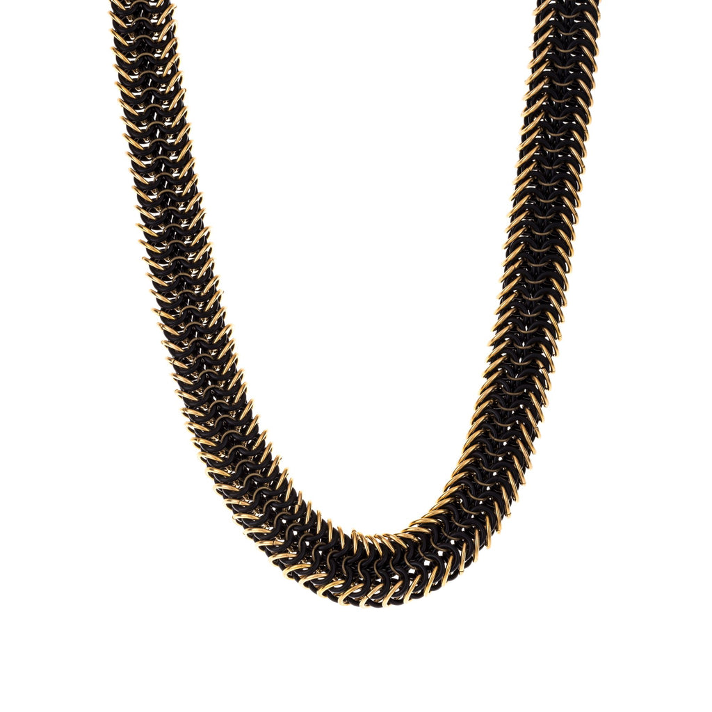 Large and long necklace made of gold and black rings
