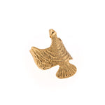 Large gold-colored bird ring seen from the side