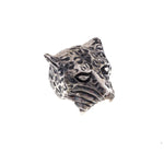 Stainless steel jaguar ring seen obliquely