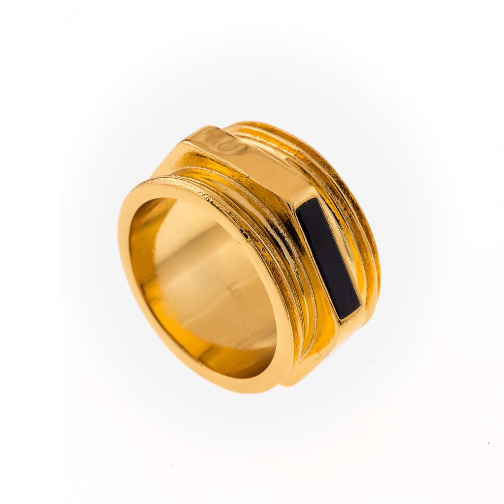 Large gold colored ring with nut shape