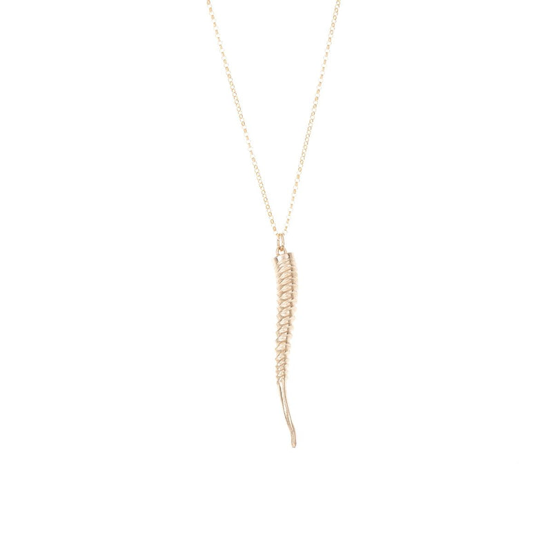 Golden pendant with fishbone