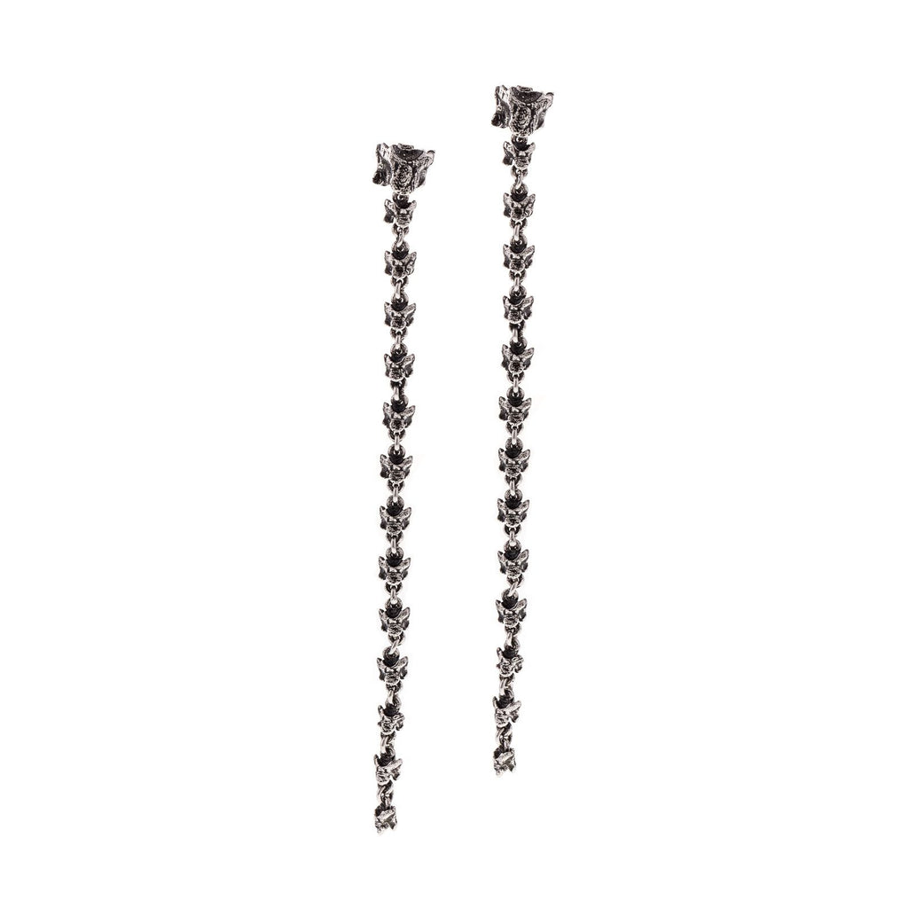 Long earrings with vertebrae-shaped links