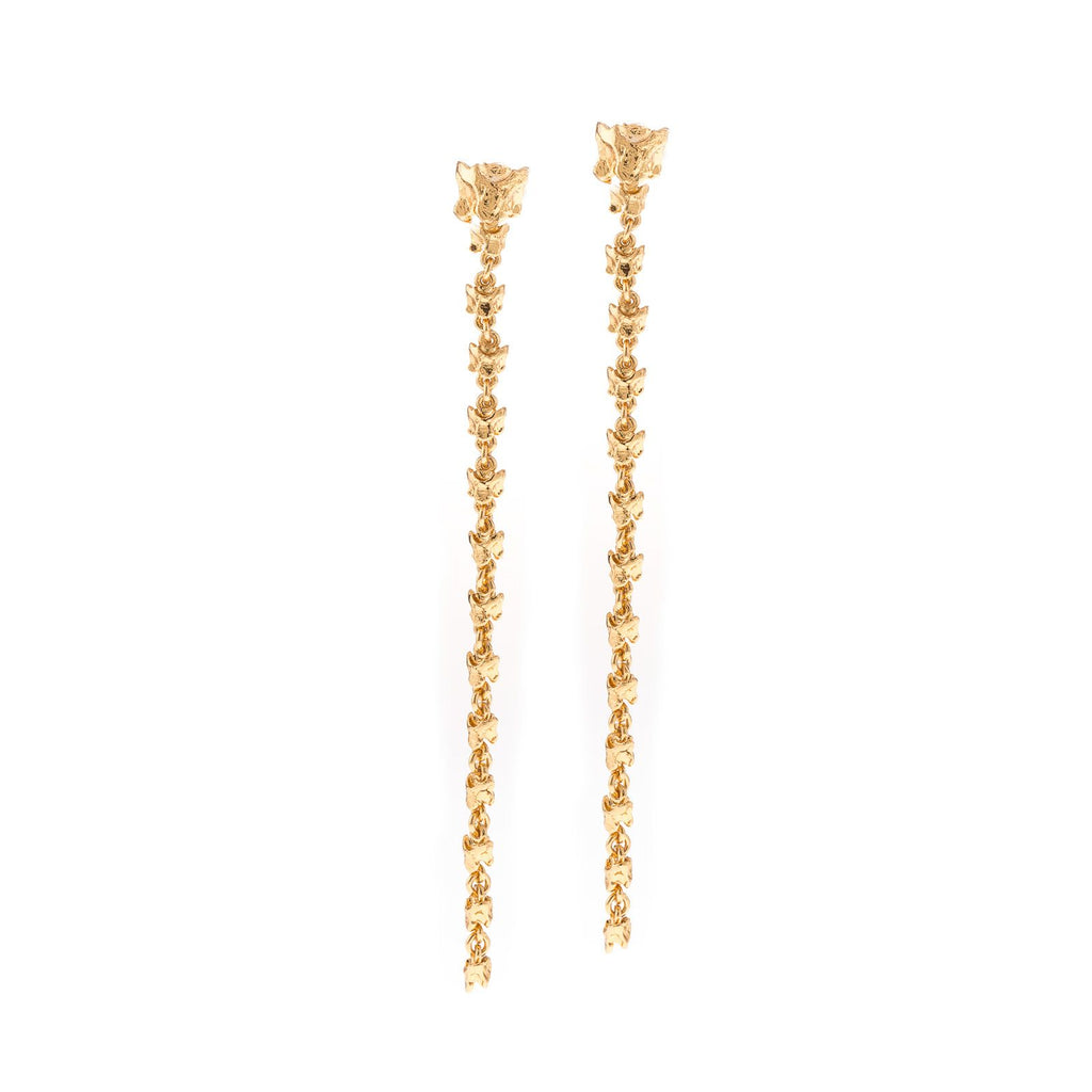 Long golden earrings with links in the shape of vertebrae