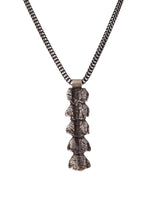 Pendant with crocodile tail beads